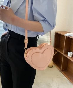 Shop Lena Jade Pink Faux Leather Heart Bag Bags
