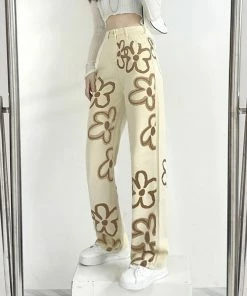 Shop Lena Jade Cream Floral Jeans Pants