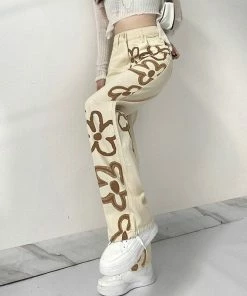 Shop Lena Jade Cream Floral Jeans Pants
